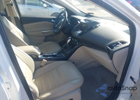 2015 Ford Escape Titanium z USA, uszkodzony, nr VIN 1FMCU9J92FUA55548